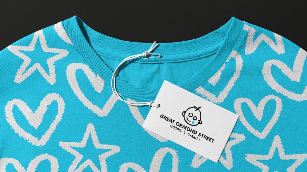 t-shirt with hearts and stars. Tag with charity logo.