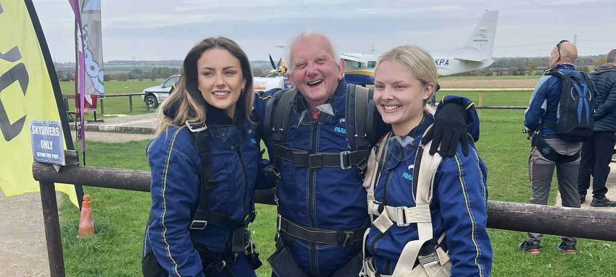 GOSH Charity fundraisers in skydiving gear after a charity skydive.