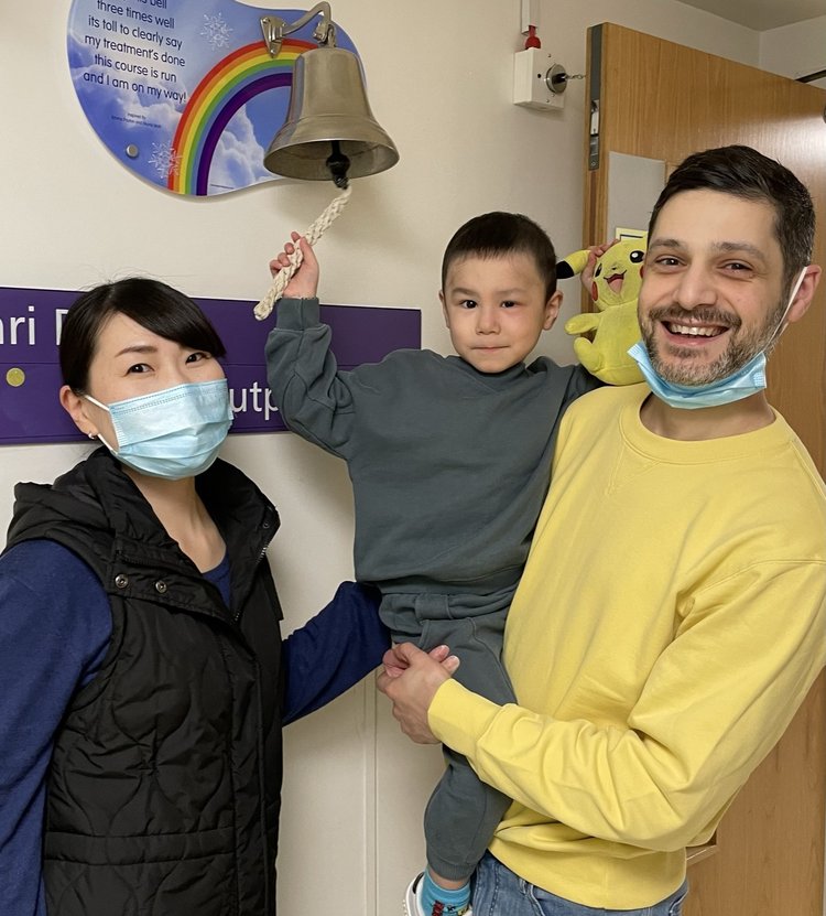 Joshua being with his dad Chris and mum Mariko