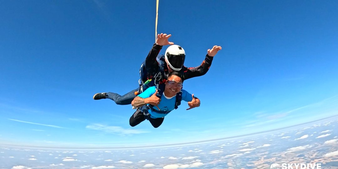 Skydiver jumping from plane