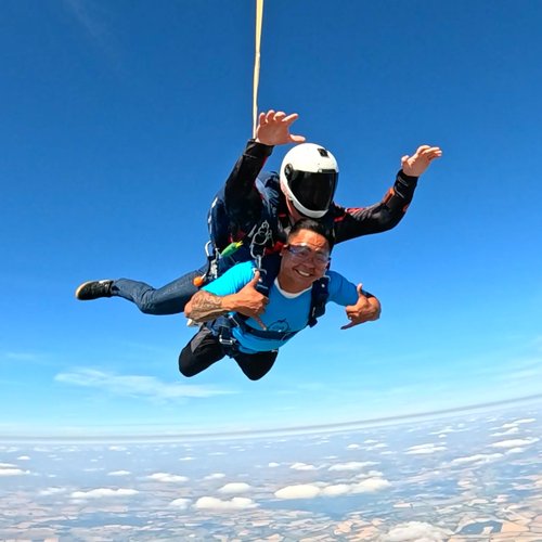 Skydiver jumping from plane