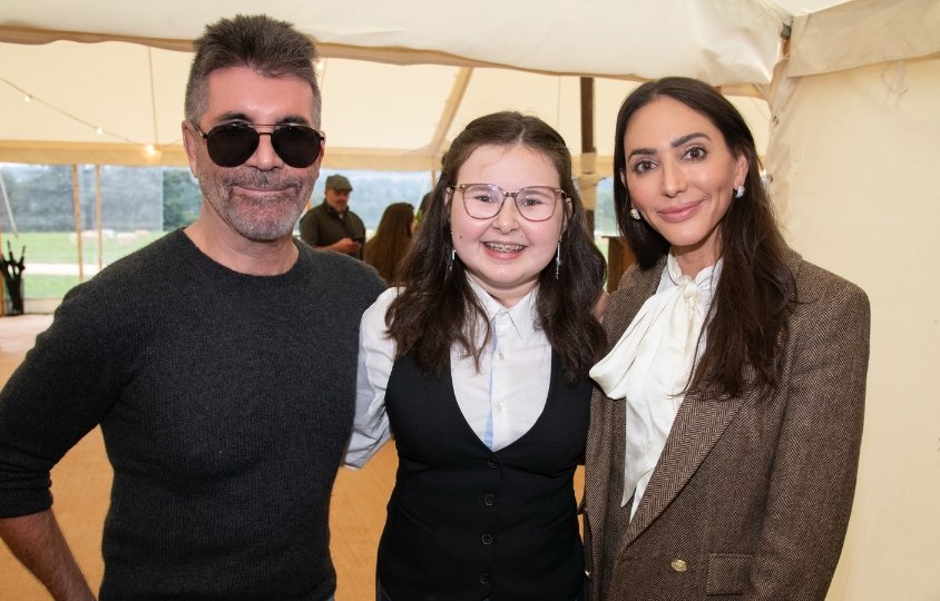 Simon Cowell and his partner meet GOSH patient Alyssa