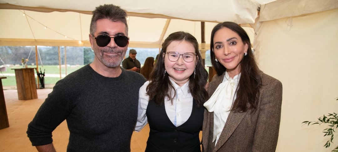 Simon Cowell and his partner meet GOSH patient Alyssa