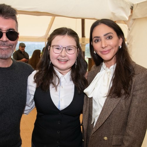 Simon Cowell and his partner meet GOSH patient Alyssa