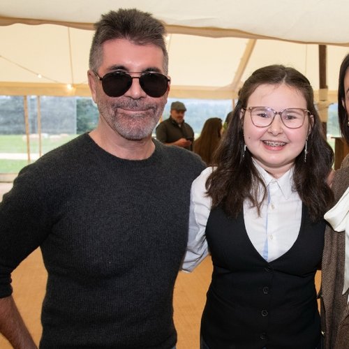 Simon Cowell and his partner meet GOSH patient Alyssa
