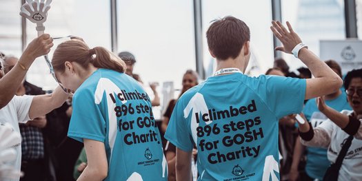 Two runners receiving their medals for the Walkie Talkie Tower Climb