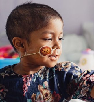 GOSH patient playing playdough with Play specialist