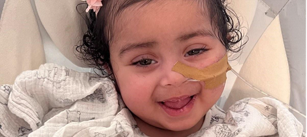 Little girl smiling to camera