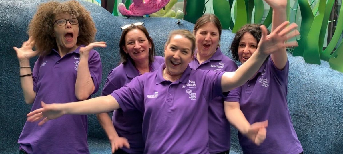 A group photo of members of the Play team
