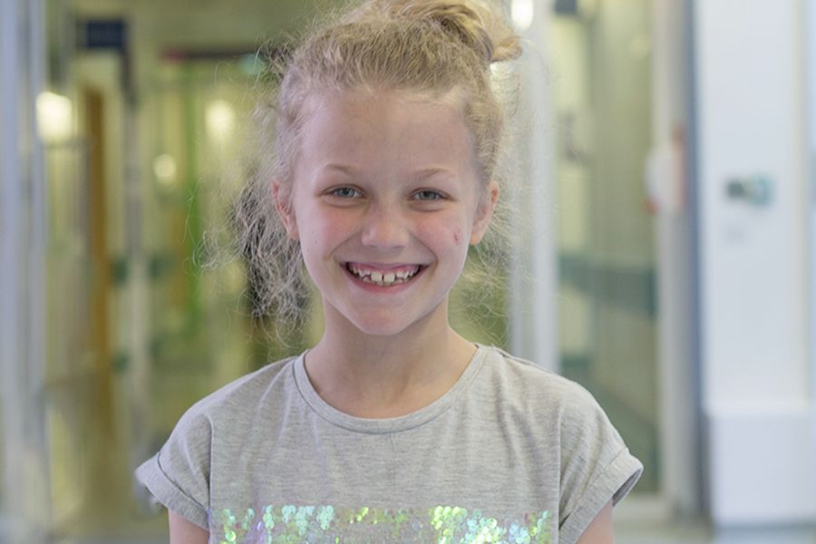 A happy looking young girl.